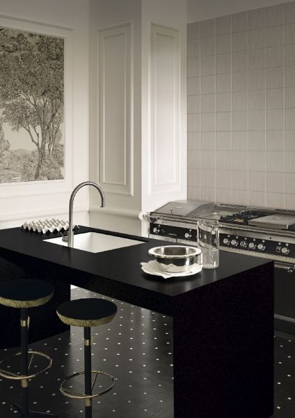Corian kitchen worksurface flowing into an integrated sink in a contemporary scheme