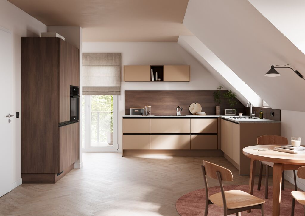 Handleless caramel and dark timber kitchen under a sloping ceiling with a black opening rail
