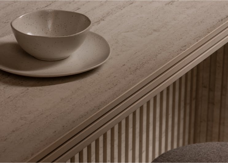 Dekton kitchen worktop with veined pattern and matching splashback