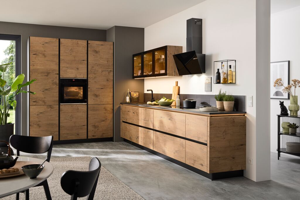 Handleless German kitchen with recessed grip rails and clean horizontal lines